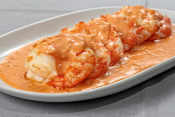 Shrimp Newburg with white rice on a plate