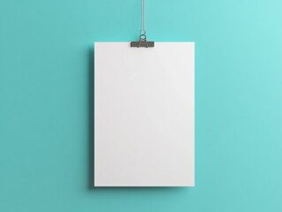 Mockup of white poster on a clip, pastel wall background