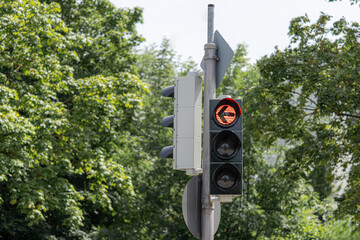 Red traffic light signal for moving vehicles.