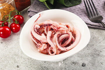 Marinated squid tentacles in the bowl