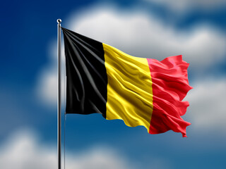 Belgium flag flying on blur blue clouds background.