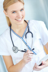 Portrait, nurse and woman with healthcare, writing and hospital for wellness, documents and career ambition. Face, notebook or medical with professional in uniform, documents or stethoscope in clinic