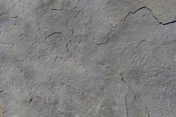 Naklejka premium Rocks worn by wind and sea found on a wild beach, which is part of a geopark.