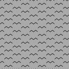 Seamless pattern with zigzag stripes on a blue background
