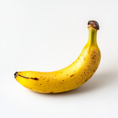 A banana is shown with a brown spot on it