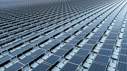 Aerial view hydro floating solar hybrid power plant, Hydro floating solar panel platform system on the lake, Power plant renewable energy source, Eco technology electric power industry.