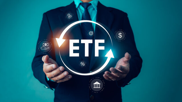 Businessman shows icons of ETF Exchange traded fund stock market trading investment financial concept, Investment Opportunities in Mutual Funds and ETFs, Stock market index fund, ETF stock options.