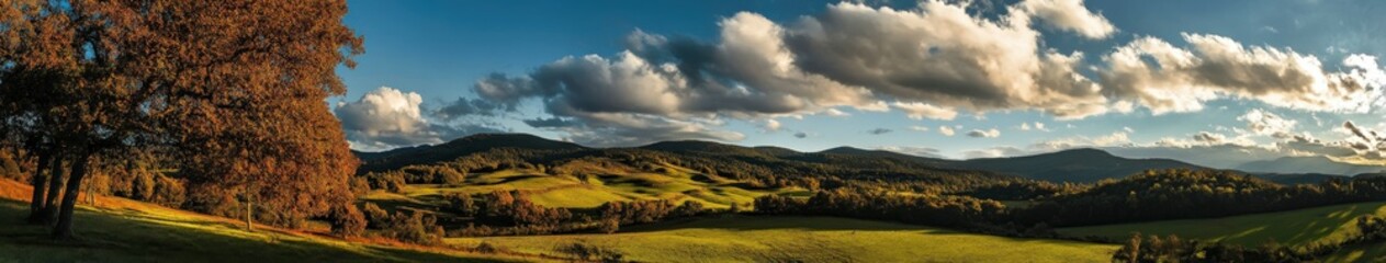 Obraz premium Vibrant autumn landscape with rolling hills and colorful foliage at sunset