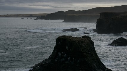 Natural rock formations on the coast in Iceland.