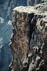 Fototapeta premium A far-off cliff face, with rugged textures and crevices 