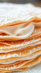 Close-up of a Delicious Pastry with Creamy Filling and Powdered Sugar