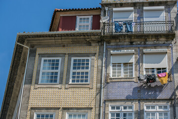 Traditional portugueses buildings with colorful facade and tiles, Porto, Portugal