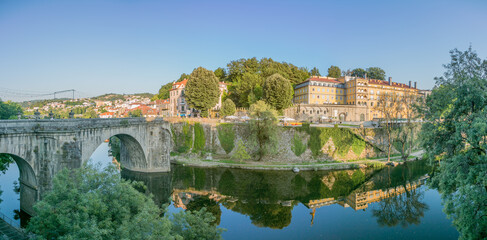 Obraz premium Old town of Amarante, Northern Portugal, Porto district, with Tamega river, ancient building and historic bridge (panorama)