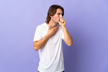 Young handsome man isolated on purple background coughing a lot