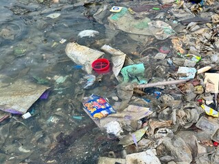 plastic pollution of the Sea, Water pollution, global crisis, accumulation of garbage industrial waste in sea, garbage in the water
