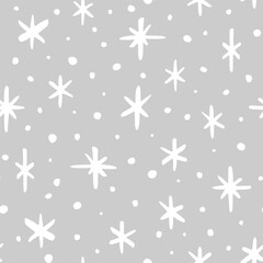 Vector seamless pattern with hand drawn snowflakes. Cute design for Christmas wrappings, textile, wallpaper and backgrounds.