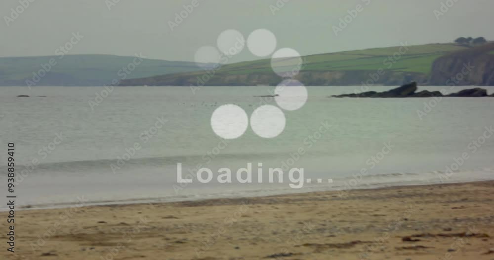 Poster loading animation over beach scene with waves and distant island
