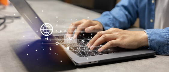 close up man hand type on laptop to browse website by use internet peering with virtual interface...