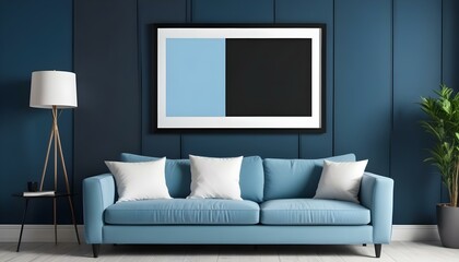 Interior mockup In a white room a blue sofa is placed next to a photo frame on the wall