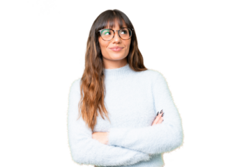 Young caucasian woman over isolated chroma key background looking up while smiling
