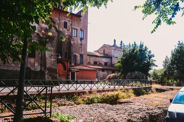A charming courtyard nestled amidst the bustling streets of Rome.