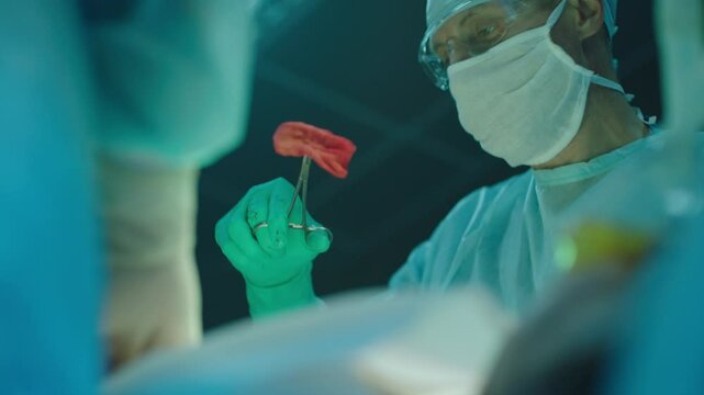 Face of a surgeon with a mask and goggles
