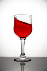 red wine glass on a white background