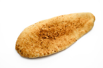Fresh pita bread close up isolated on white background