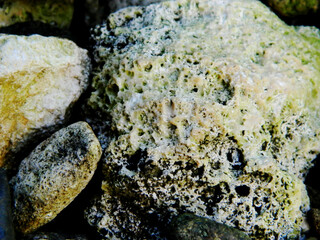 Abstract background with mountain rocks. Large shaped rocks that can be found on the shore of the sea, lake or river.