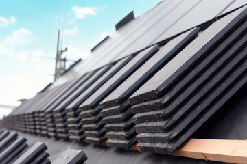 Roofing Materials Stacked on  Construction Site in Preparation for Installation in Daylight