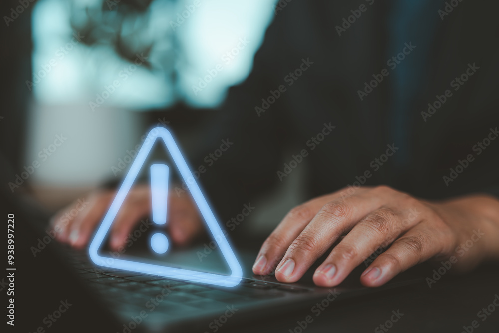 Poster Businessman using computer laptop with triangle caution warning sign for notification error and maintenance concept.