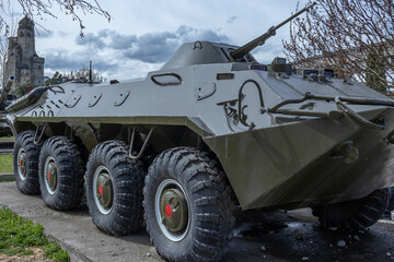 Fototapeta premium An armored transport and combat vehicle for the transportation of personnel. A Soviet armored personnel carrier. Combat wheeled floating armored vehicle for transporting soldiers and fire support