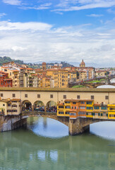 View over the historic Ponte Vecchio bridge and Arno river in Florence, Italy