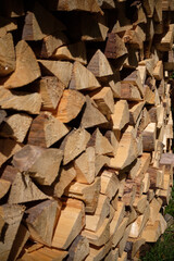 Stacked firewood neatly arranged in a pile