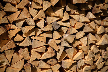 Stacked firewood neatly arranged in a pile