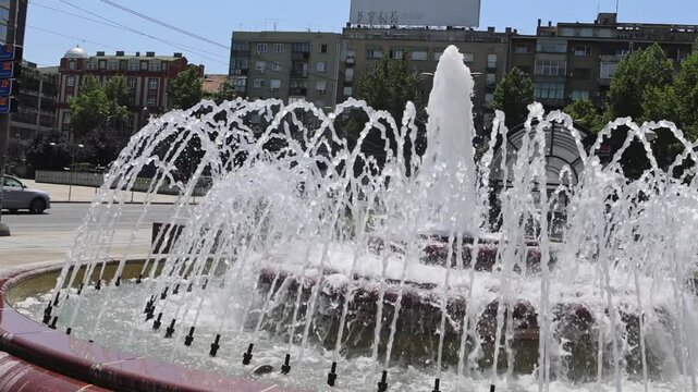 Walking Around Water Fountain Splash at Vuk Square in Belgrade Serbia Hot Summer Day