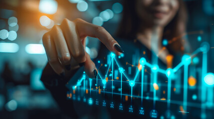 A business woman points her finger at a virtual digital screen in the form of a chart, analyzes the data. Business and development concept.