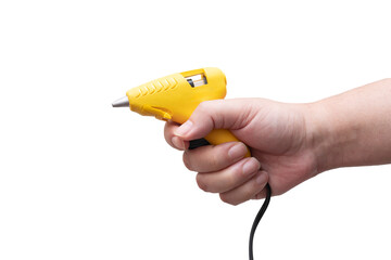 side view of hand holding yellow glue gun with blank text space  used for small joint attachment,...