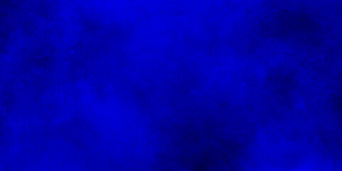 Blue dark grunge texture background of cement plaster wall with cracks,blue powder exploding. textured background in blue tones.Light blue background with distressed vintage texture and space for your