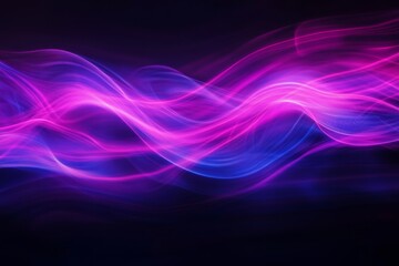 Obraz premium Abstract Waves of Neon Lights Creating a Mesmerizing and Ethereal Visual Symphony in the Dark
