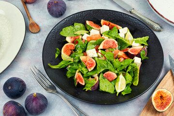 Plate of fresh salad with figs