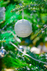 Christmas tree with designs toys. Festively decorated Christmas tree with garlands. Symbol of the new year.