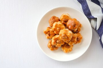 Cashew nut cookies,Singapore Cookies in a white plate on white background