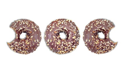 Top view of three, delicious chocolate doughnuts sprinkled with nuts, isolated on white background.