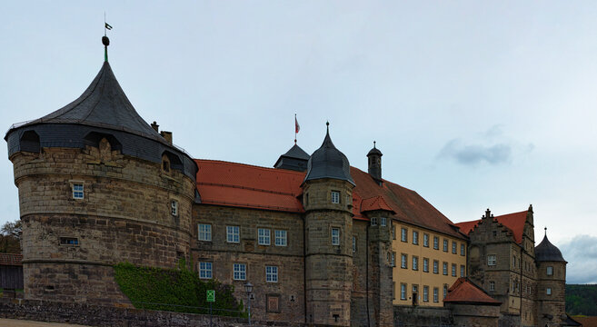 Kronach, Germany-April 10,2024:Panoramic landscape view of famous medieval Rosenberg Fortress in Kronach, Germany in Upper Franconia, Bavaria. Cloudy sky background. Travel and tourism concept