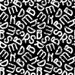 White letters on a black background. Seamless background for fabrics, textiles, packaging and wallpaper. Vector illustration