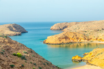 Bandar Al Khairan omani fjord lagoon with sandy beaches, islands and mountains , Muscat, Oman