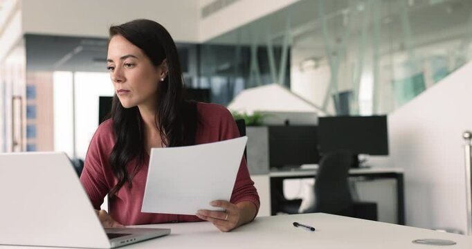 Businesswoman do paperwork, read written information in documents, using laptop, working on tasks, busy in reports preparation, reviewing, editing agreement details, make analysis working in office