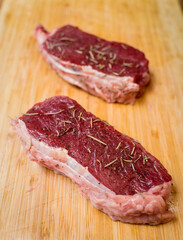 Raw fillet beef meat for steaks on the cutting board