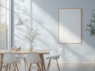 A white framed picture hangs on a wall in a room with a wooden table and chairs
